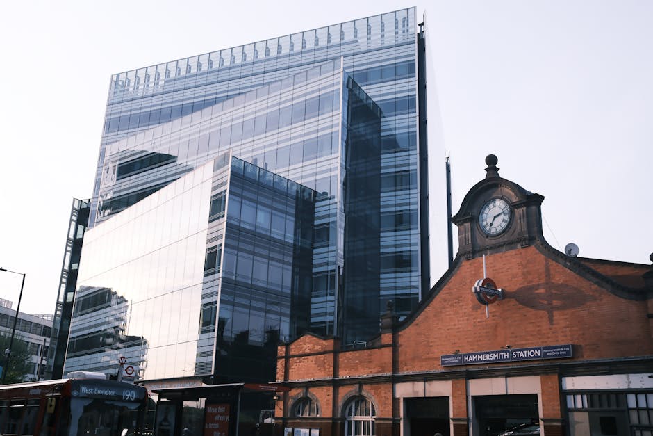 Exterior view of a multi-story residential building on King Street in Hammersmith, featuring classic Victorian architectural details. The building's facade is constructed from brown brickwork accented